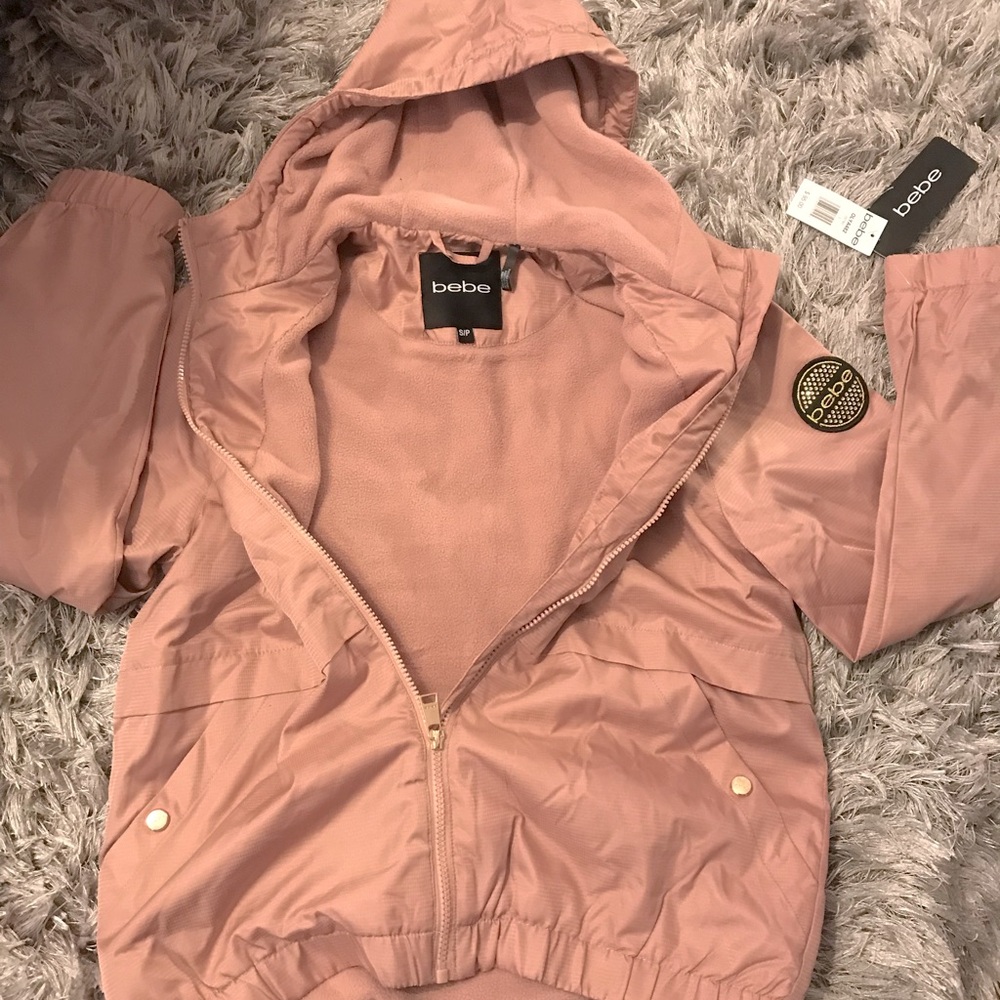 Light weight pink Bebe windbreaker with gold accents